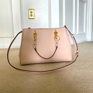 Brand New Light Pink Micheal Kors Bag. Travel bag included with purchase.